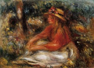 Young Woman Seated On The Grass